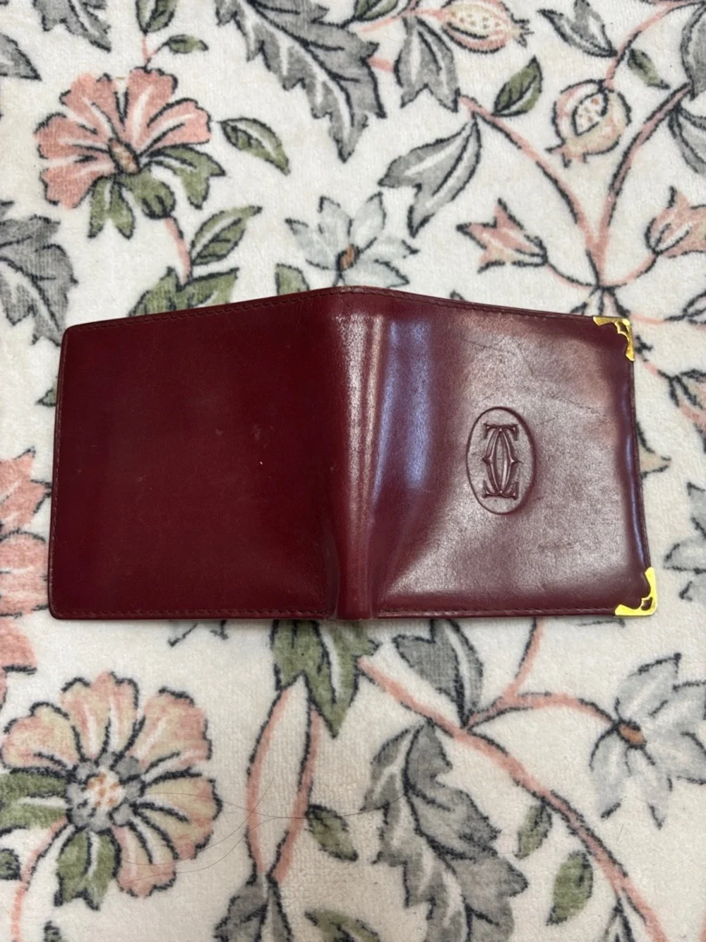 Cartier‎ Burgundy Leather Bifold Wallet with Gold Corners